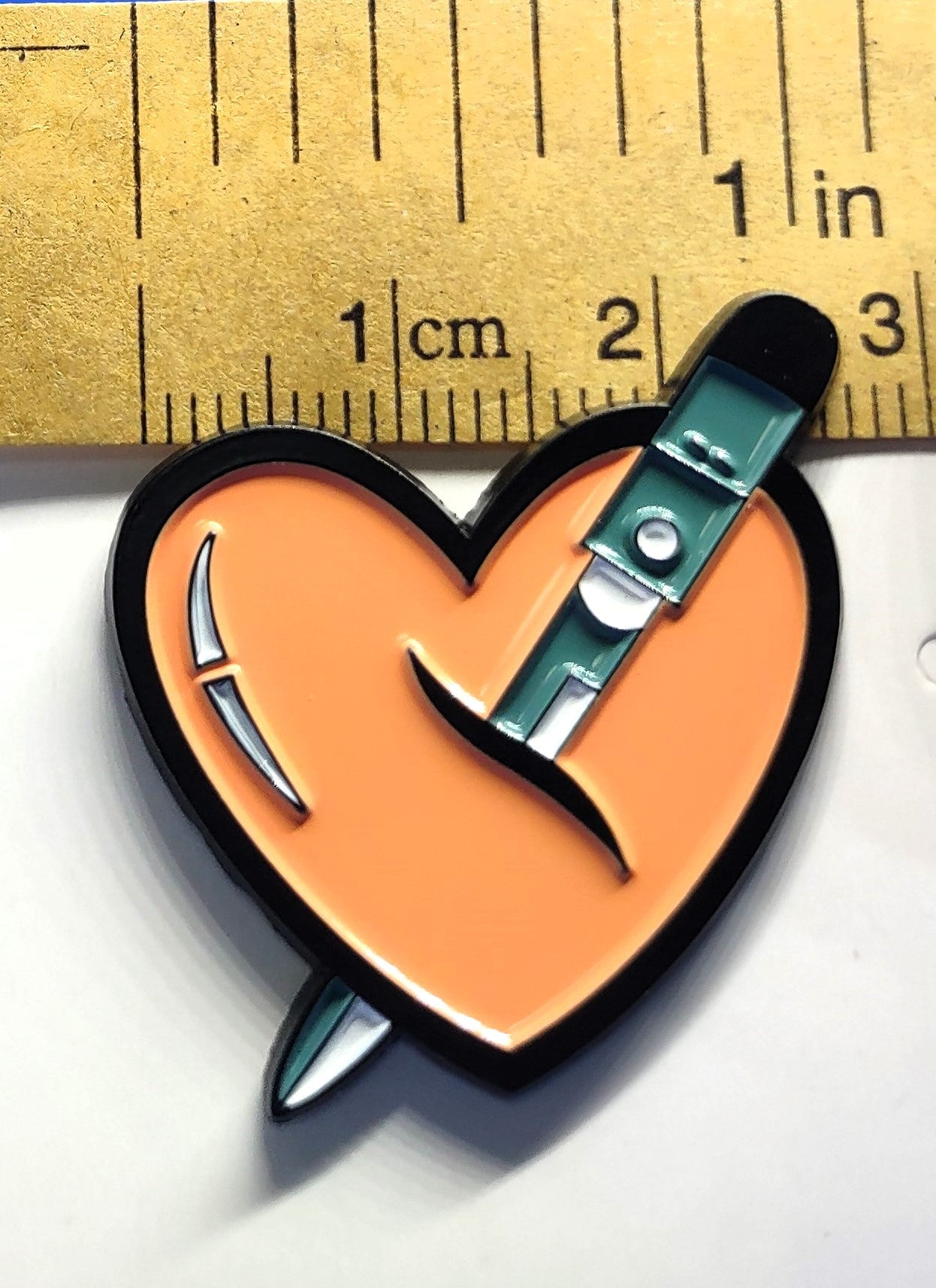 Orange Heart with Knife Pin